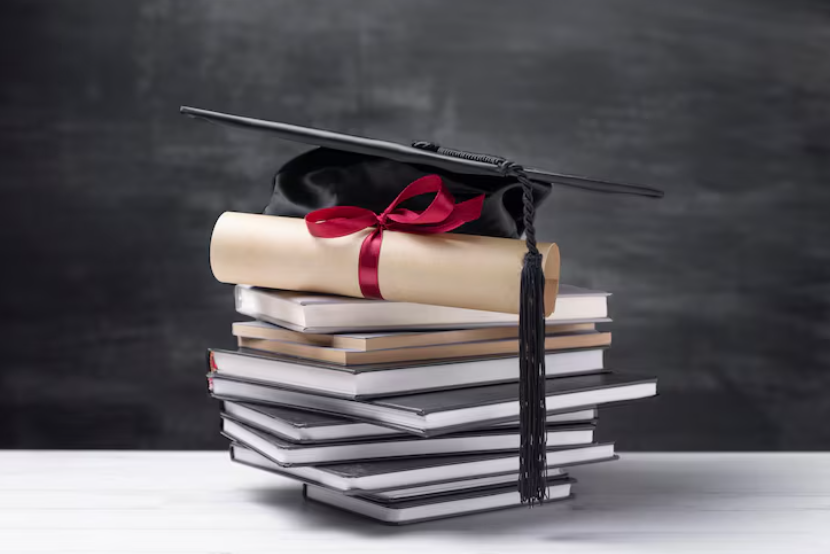 what is a stackable degree and how it works, illustrated by stacked books and diploma concept